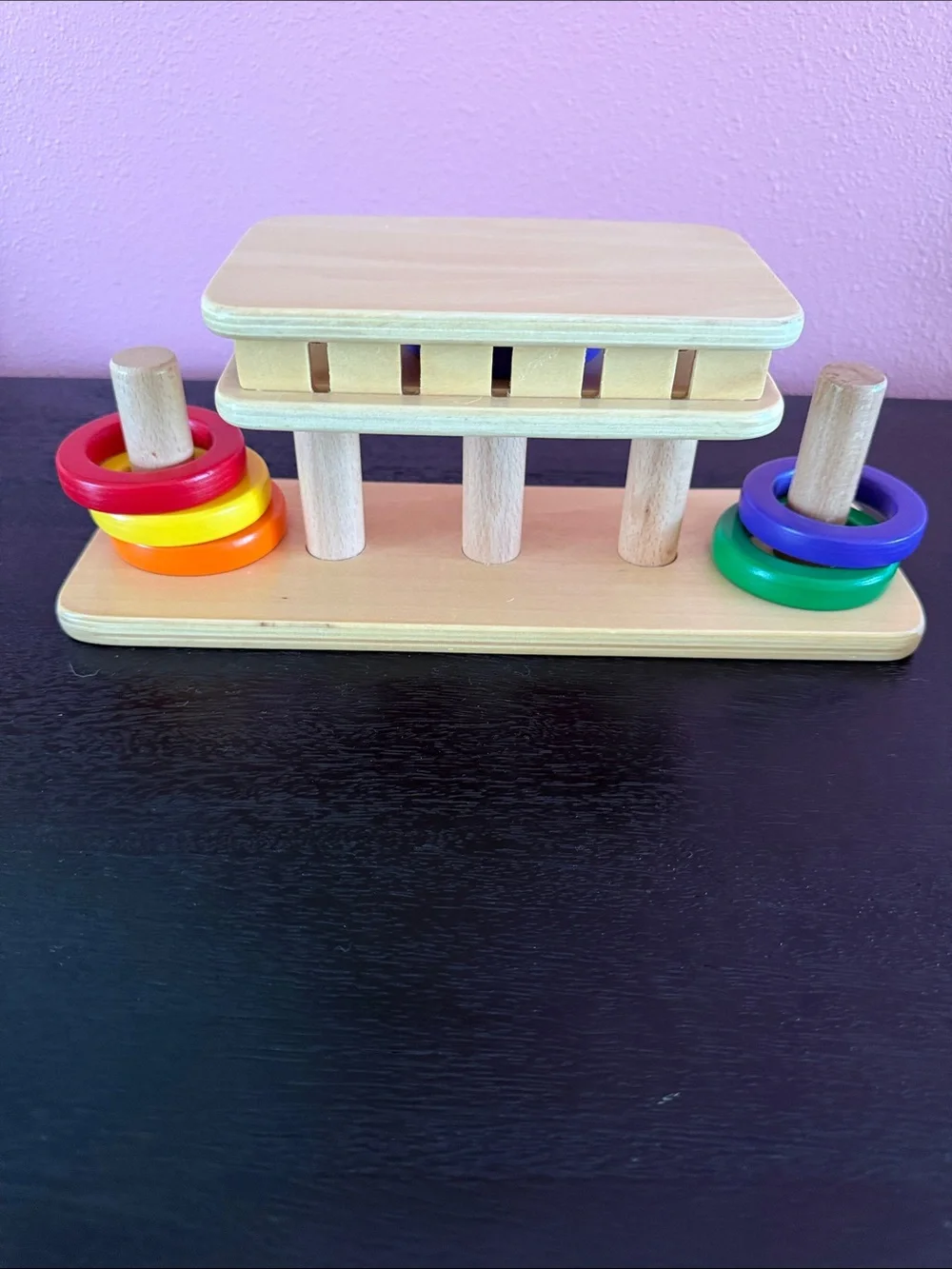 MontiKids Wooden Ring Slide Toy - Natural with Red, Orange, Yellow,Purple, Green